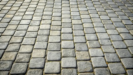 A Cobblestone Path's Textured Surface, Showing Subtle Variations in Stone Shade and Alignment