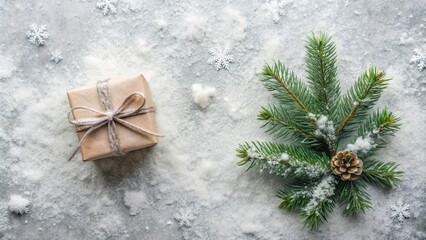 Fototapeta premium A rustic winter scene with a gift and evergreen bough