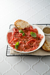 Traditional beef carpaccio with truffle oil