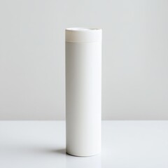 Water filter cartridge standing upright on a clean surface with a minimalist background in a well-lit indoor setting
