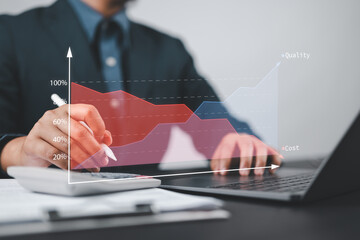 Business cost and quality analysis for performance optimization. businessman typing on keyboard...