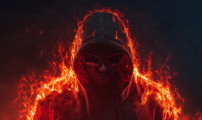 Man in a Black Hoodie with a Fiery Red Aura, Exuding Energy and a Powerful Presence