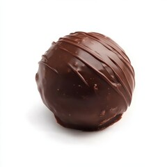 Exquisite chocolate truffle with a shiny finish resting on a plain surface