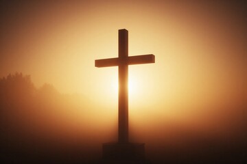 large wooden cross in mist with sun rising creating halo