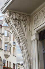 balconies with white brackets in the form of a plant ornament with leaves white facade of an eclectic house from the early 1900s is publicly available for viewing without requiring special permission © sjv156