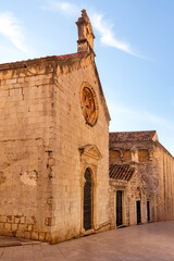 Dubrovnik Old Town. Photo of empty streets, old architecture. Church with a stained glass window