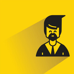 businessman with shadow on yellow background