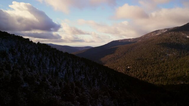 Aerial view of the mountains of Navacerrada in Castilla Leon during a winter afternoon