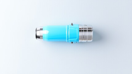 Blue cylindrical object on light blue background, product photography, industrial design