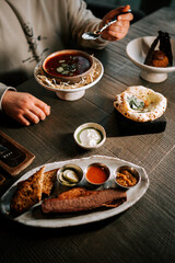 Tasting traditional cuisine with rich flavors and vibrant colors showcased on a rustic wooden table