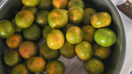fresh citrus fruits as background, top view