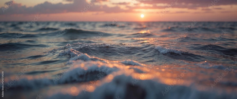 Canvas Prints Close-up view of Atlantic Ocean waves reflecting sunset colors creating a serene and tranquil atmosphere.