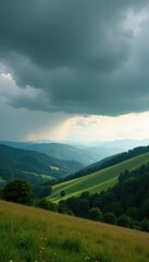 Naklejka premium Dark grey clouds gather over a landscape of rolling hills and trees, rolling hills, nature