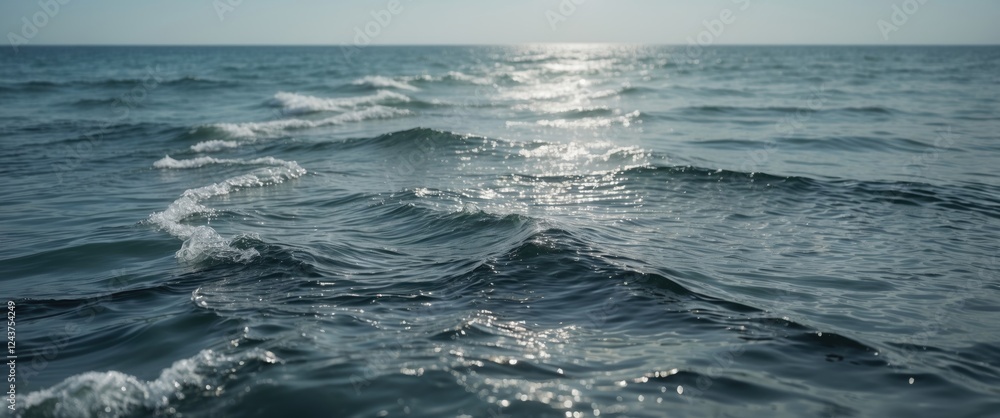 Poster tranquil ocean waves reflecting sunlight with space for custom text and messages