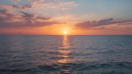 Obraz premium Serene Ocean Sunrise Illuminating Tranquil Waters Under a Colorful Sky