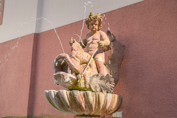 Brunnen, Putte reitet auf Delfin, Schloß Weilburg, Landkreis Limburg-Weilburg, Hessen, Deutschland © Frank