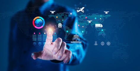 Man Pointing at Global Supply Chain Icons on World Map for Logistics and Transportation