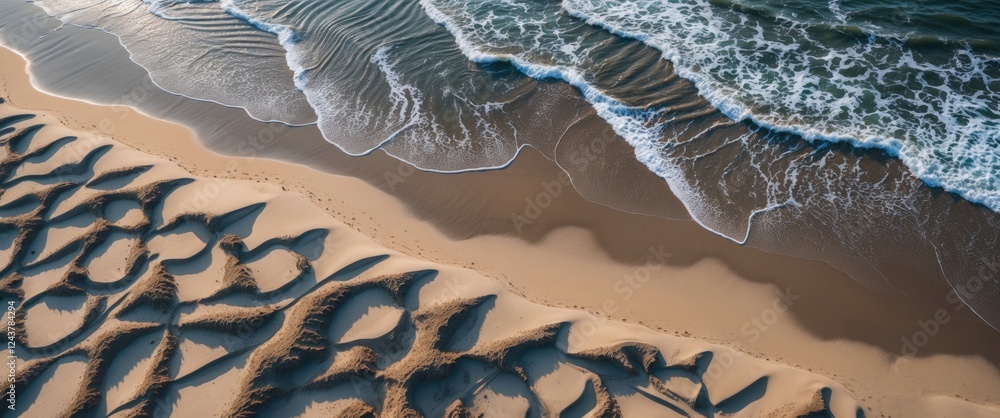 Poster aerial view of intricate sand patterns shaped by ocean waves, highlighting natural textures and form