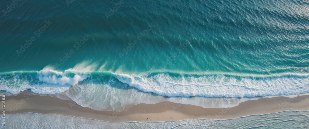 Poster aerial view of turquoise ocean waves gently meeting a sandy beach with ample empty space for text or