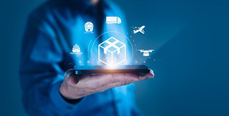 Man Holding Smartphone with Supply Chain Icons on Virtual Screen.Photo Description: