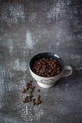 a cup of coffee beans on the table