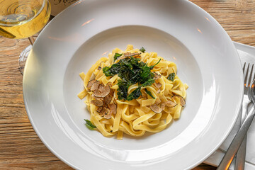 tagliatelle with winter truffles and fried flat-leaf parsley