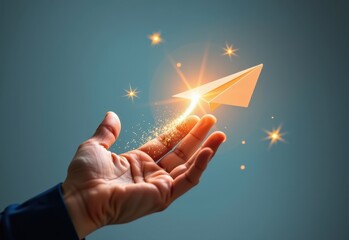 A hand releases a paper airplane with a trail of sparkling light following it symbolizing dreams aspirations and the pursuit of goals.