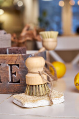 Eco-style cleaning, wooden brushes with natural bristles and loofah sponges for washing dishes