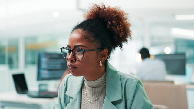 Woman, software developer or programming with computer for app development or coding at office desk. Female person, programmer or coder with glasses or technology for UI, UX or AI design at workplace