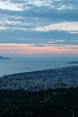 view from the top of the hill of the city and the sea in Albania