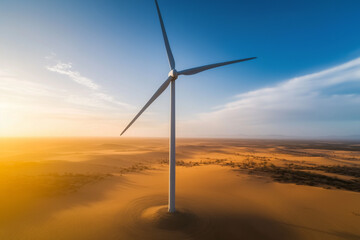 Obraz premium Landscape view of wind turbine farming on desert with sun set view, Selective focus wind turbine with generator in desert, Renewable energy concept.