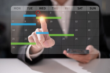 Businessman working on laptop schedule planning time calendar management deadline organization concept