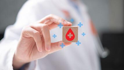 Blood donation on wooden block doctor health care physician disease concept
