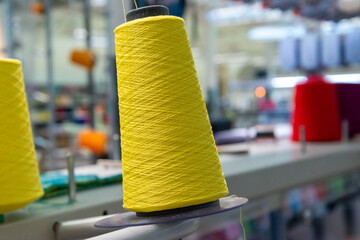 yellow spool of threads