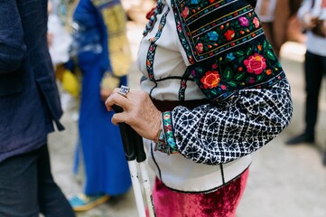Traditional attire featuring vibrant embroidery and ornate details