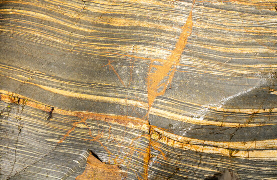 Textured Rock Formation with Coastal Layers