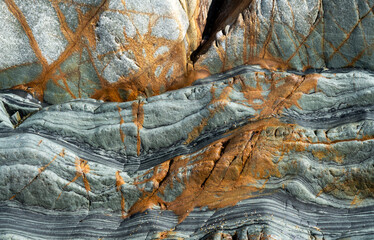 Textured Rock Formation with Coastal Layers