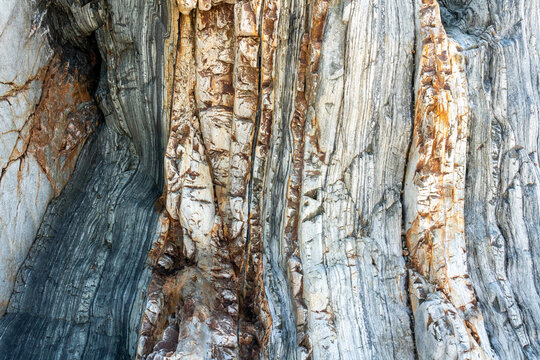 Textured Rock Formation with Coastal Layers