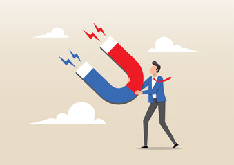 A businessman holding a high-power magnet to attract all benefits