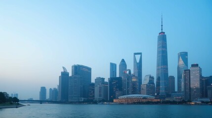 Fototapeta premium Modern City Skyline with River at Dusk in Urban Environment