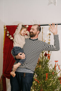 Father And Son Spend Time Together At Christmas