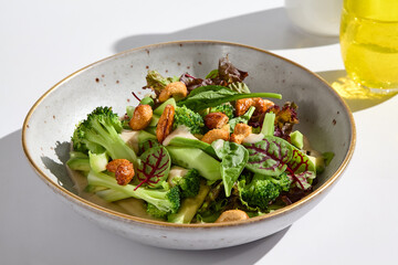 Fresh Green Salad with Cashew and Avocado in Bright Natural Light