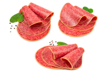 Salami slices isolated on white background.