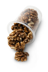Obraz premium Walnuts in a plastic cup isolated on transparent background