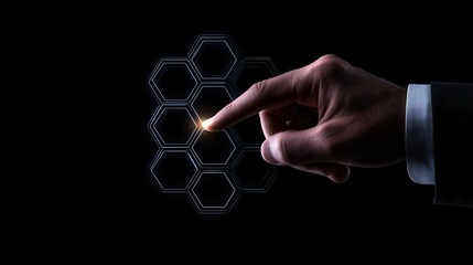 A hand interacts with a digital hexagon interface, symbolizing innovation and technology advancements.