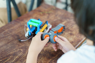 Group of diverse children enjoy learning about the STEM.