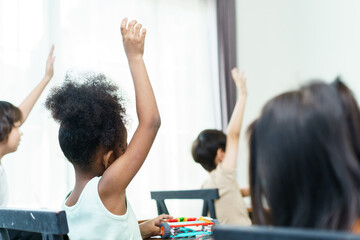 Group of diverse children enjoy learning about the STEM.