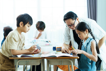 Group of diverse children enjoy learning about the STEM.