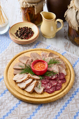 Culinary Presentation of Meat Assortment Featuring Veal Tongue with Rustic Charm