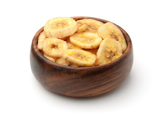 Dried banana chips in wooden bowl